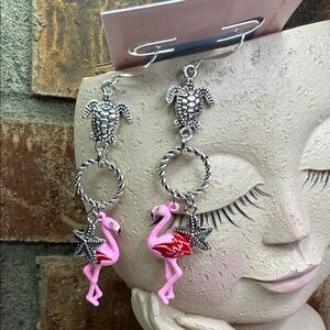 Pink Flamingo and Silver tone starfish charming Earrings